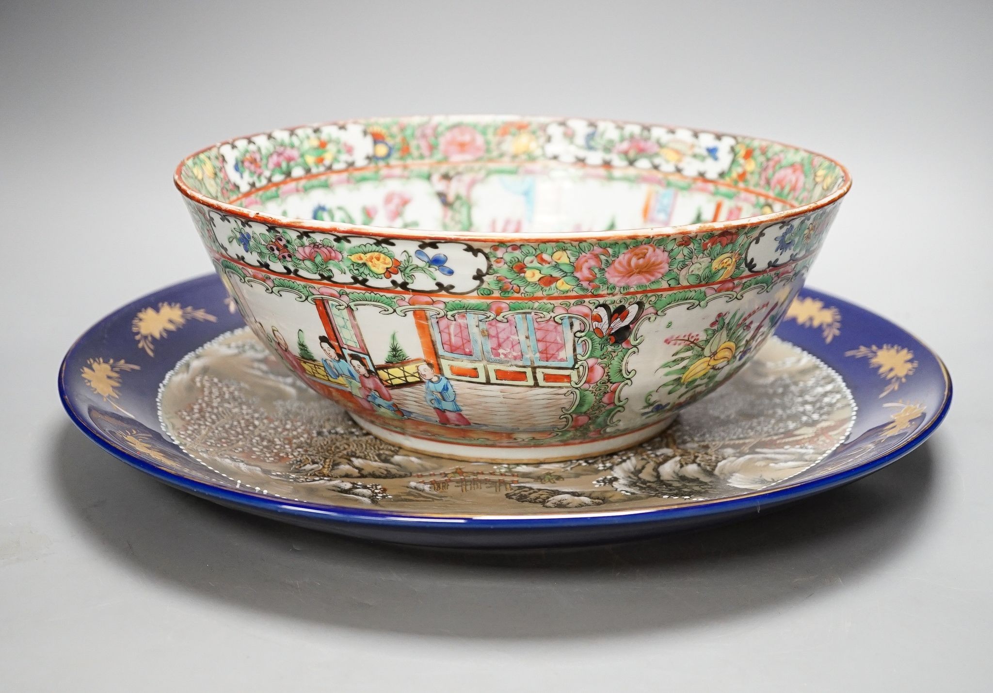 A late 19th century famille rose bowl and a Chinese porcelain dish, bowl 30 cms diameter.